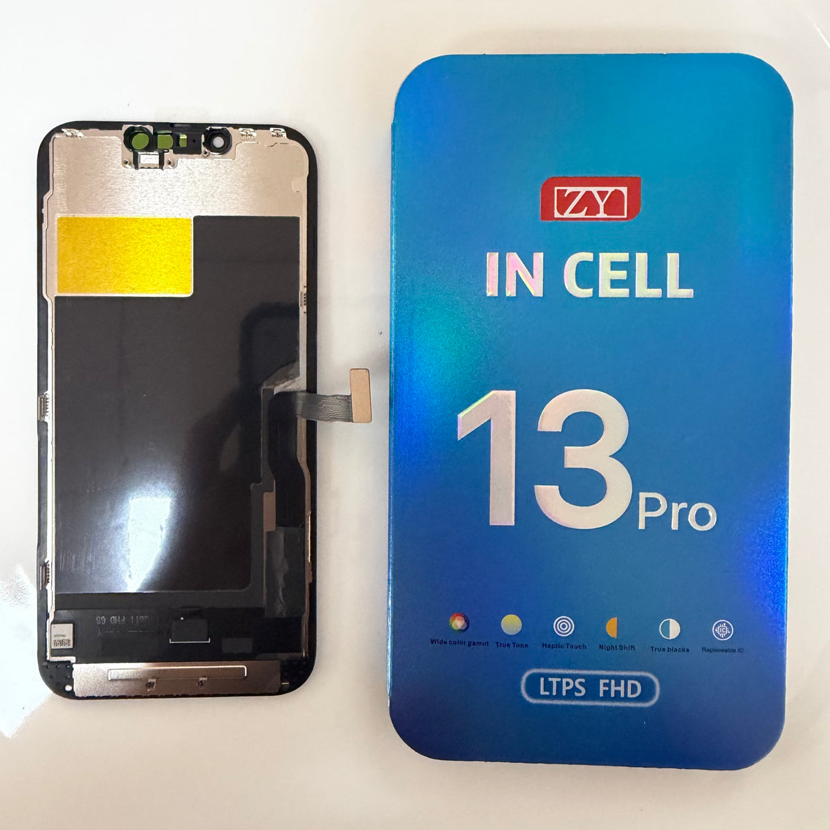 FHD incell LCD screen for iPhone 13 Pro beside its box