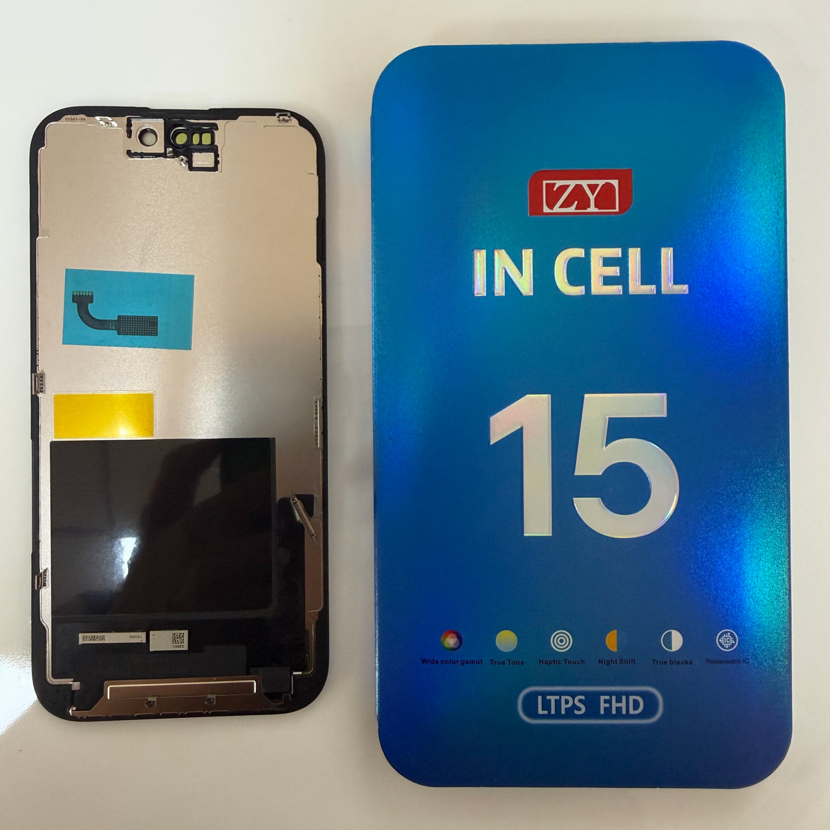 FHD incell LCD screen for iPhone 15 beside its box