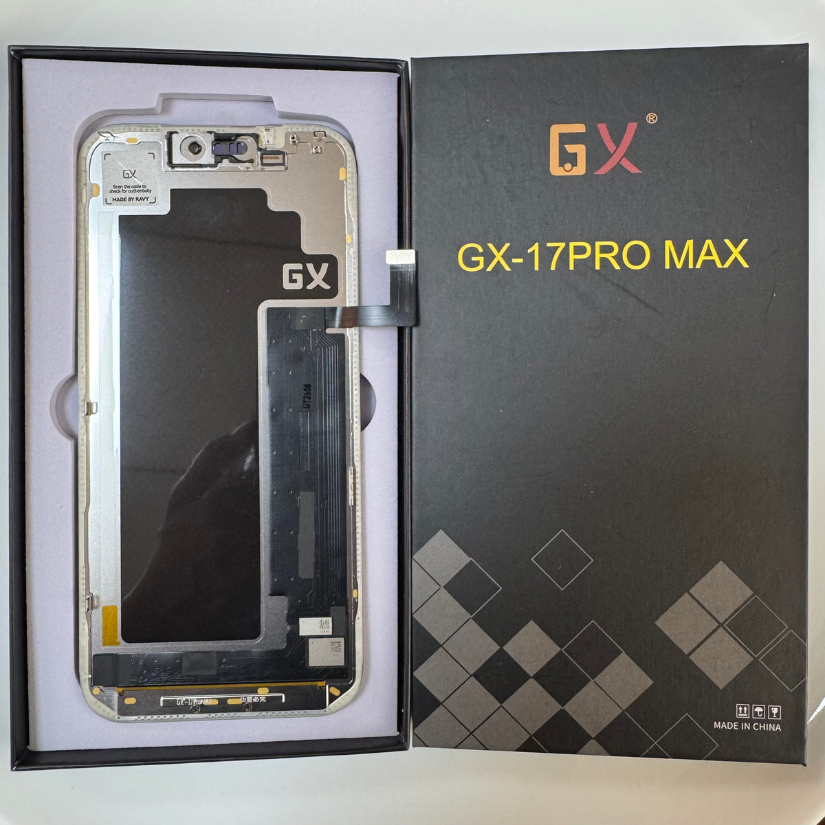 Soft OLED screen for iPhone 17 Pro Max in its tray, beside its labelled box
